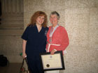 Betty received the Order of Manitoba in 2010. Here she is with the person who nominated her, Brenlee Carrington Trepel